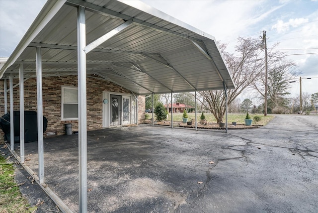 view of parking featuring a carport