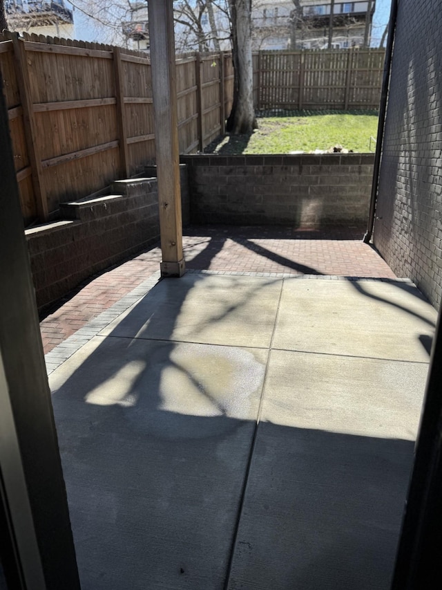 view of patio featuring a fenced backyard