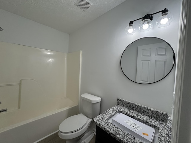 full bath with a textured ceiling, bathtub / shower combination, toilet, vanity, and visible vents