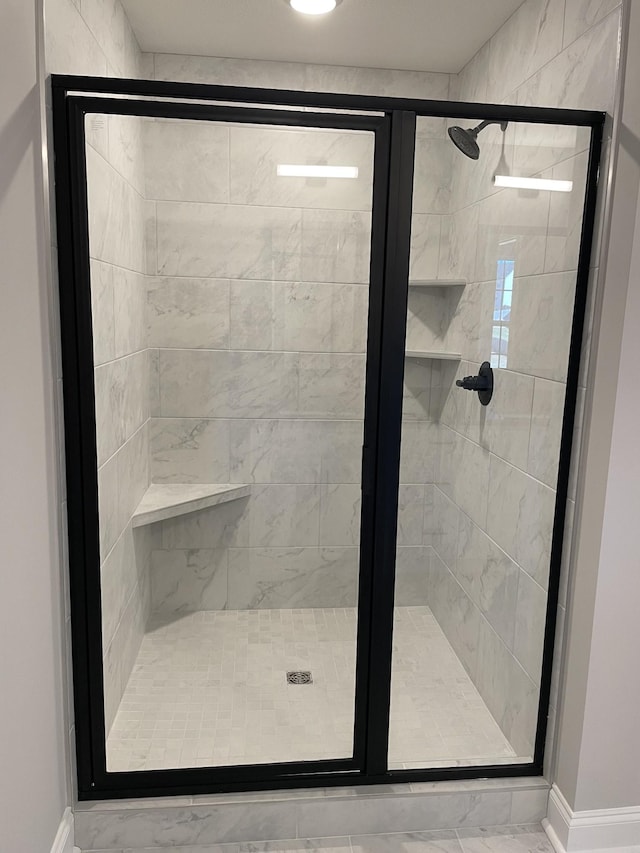 bathroom featuring a stall shower