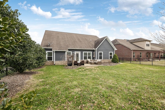 back of property with a fenced backyard, an outdoor living space, a lawn, and brick siding