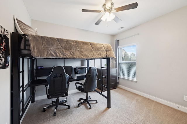 bedroom with carpet floors, baseboards, visible vents, and ceiling fan