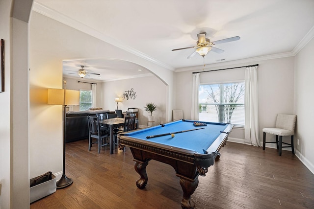 rec room featuring a ceiling fan, baseboards, wood finished floors, and ornamental molding