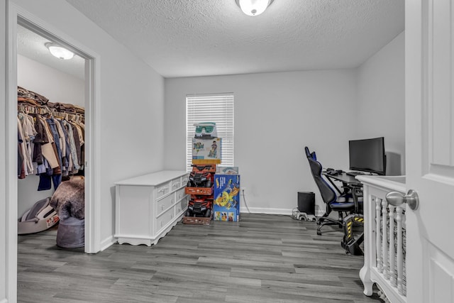 820 Lower Park Pl, Antioch, TN 37013 - office featuring a textured ceiling, baseboards, and wood finished floors