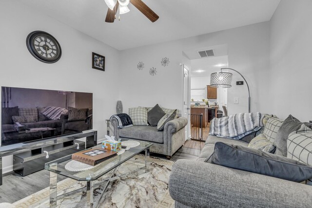 820 Lower Park Pl, Antioch, TN 37013 - living room with visible vents, ceiling fan, baseboards, and wood finished floors