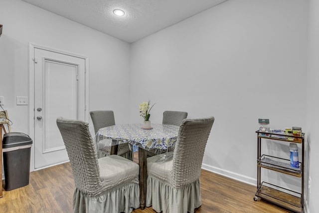 820 Lower Park Pl, Antioch, TN 37013 - dining area featuring a textured ceiling, wood finished floors, and baseboards