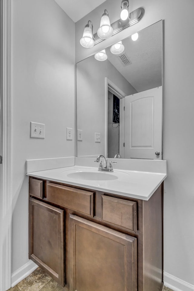820 Lower Park Pl, Antioch, TN 37013 - bathroom with baseboards, visible vents, and vanity