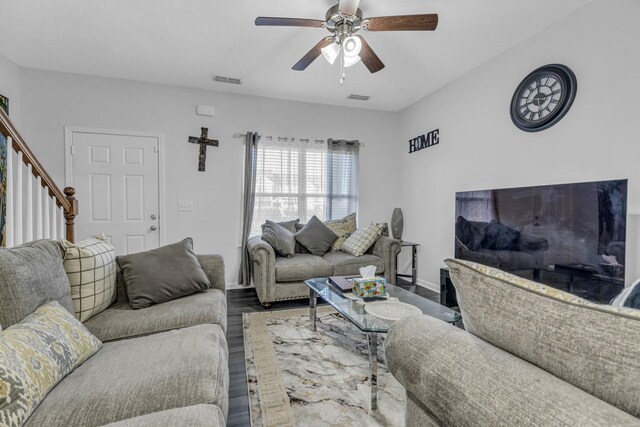 820 Lower Park Pl, Antioch, TN 37013 - living room featuring visible vents, ceiling fan, stairway, and wood finished floors