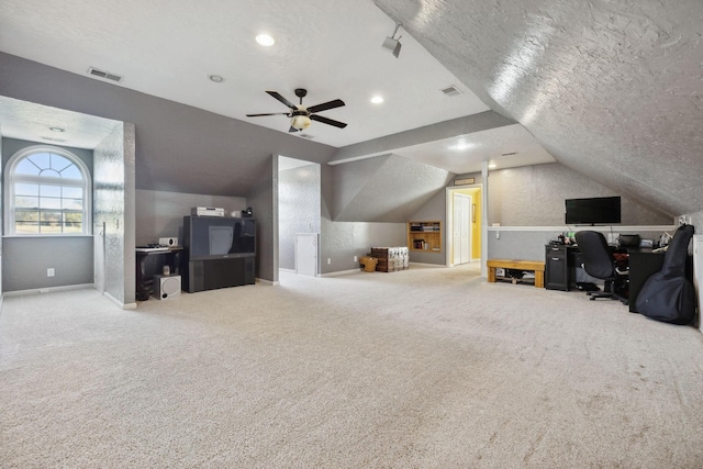 bonus room with carpet, visible vents, vaulted ceiling, and a textured ceiling