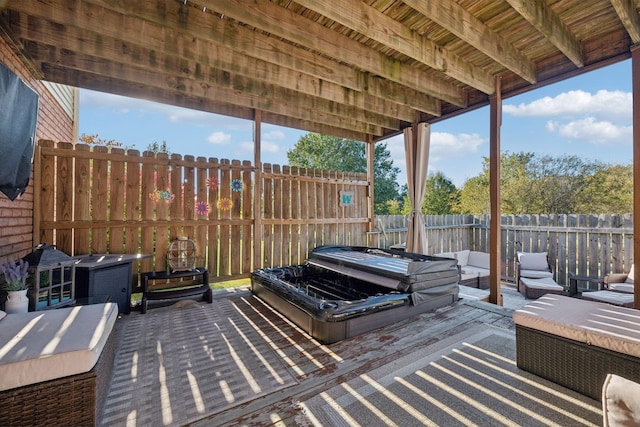 view of patio featuring an outdoor hangout area and a fenced backyard