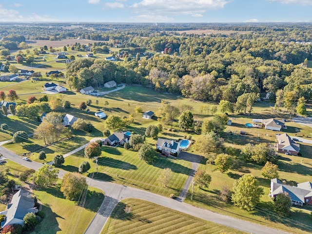 birds eye view of property featuring a rural view