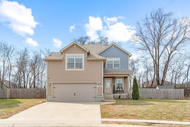 craftsman house featuring an attached garage, fence, concrete driveway, board and batten siding, and a front yard