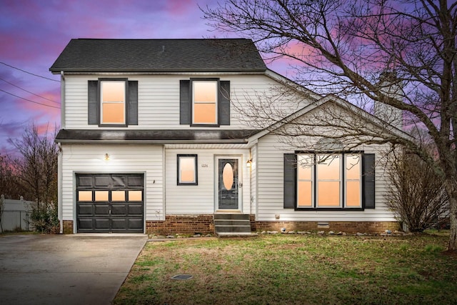 view of front of home featuring entry steps, an attached garage, concrete driveway, crawl space, and a front yard