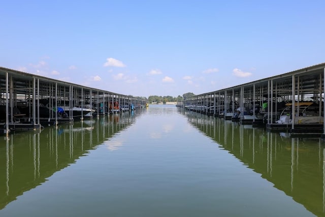 dock area featuring a water view and boat lift