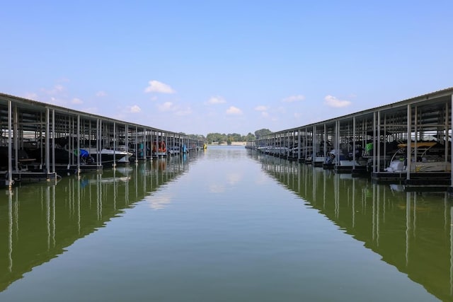 view of dock featuring a water view and boat lift