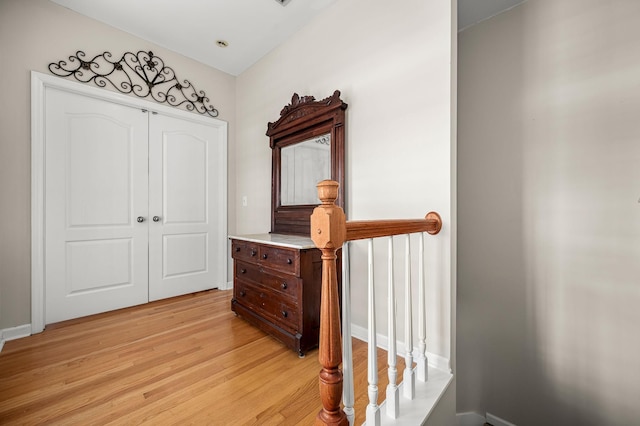 hall with light wood-type flooring