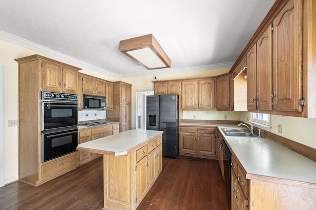 kitchen featuring a center island, dark wood-style flooring, a sink, and black appliances