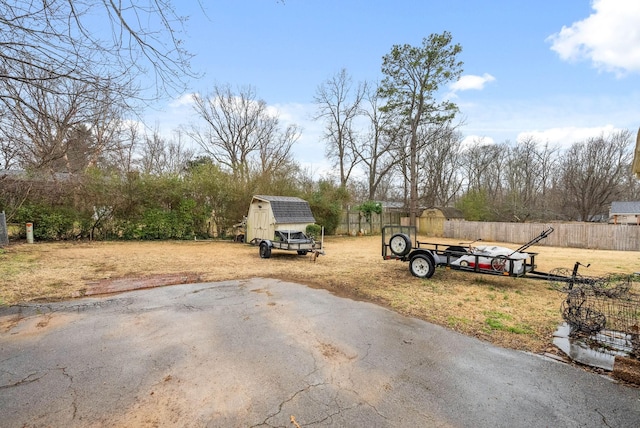 view of road featuring aphalt driveway