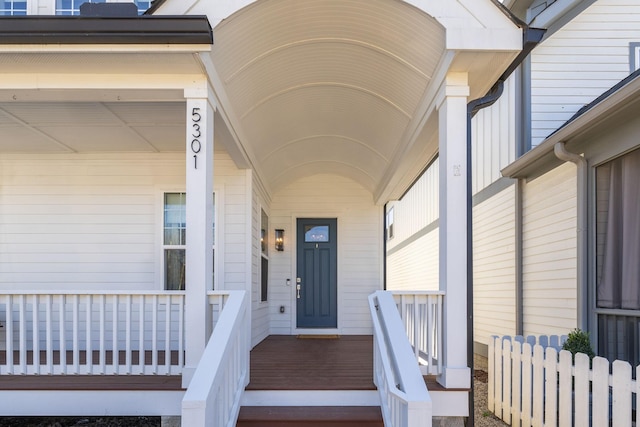 doorway to property with a porch