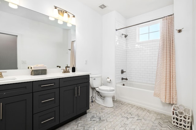 bathroom with visible vents, a sink, shower / bathtub combination with curtain, and toilet