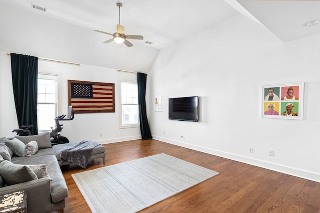 living room with lofted ceiling, dark wood-style flooring, visible vents, and baseboards