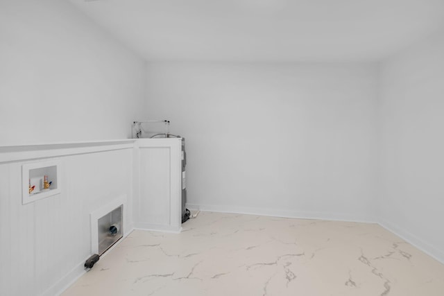 laundry area with laundry area, washer hookup, and baseboards