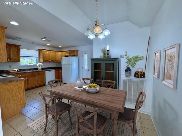dining room featuring visible vents, an inviting chandelier, recessed lighting, lofted ceiling, and light tile patterned floors