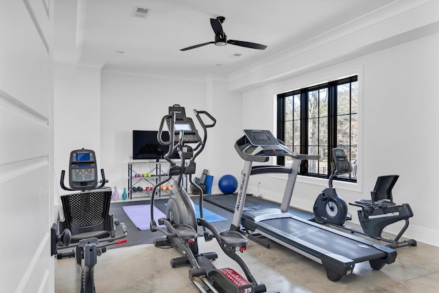 workout room with baseboards, visible vents, ceiling fan, and crown molding