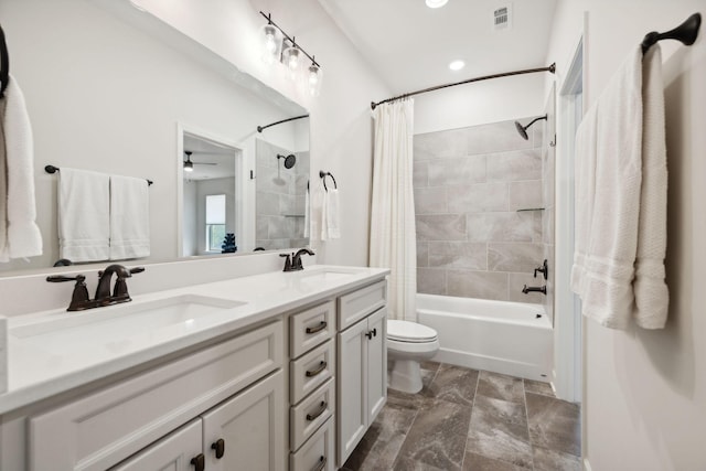 full bath with toilet, shower / bathtub combination with curtain, double vanity, and a sink