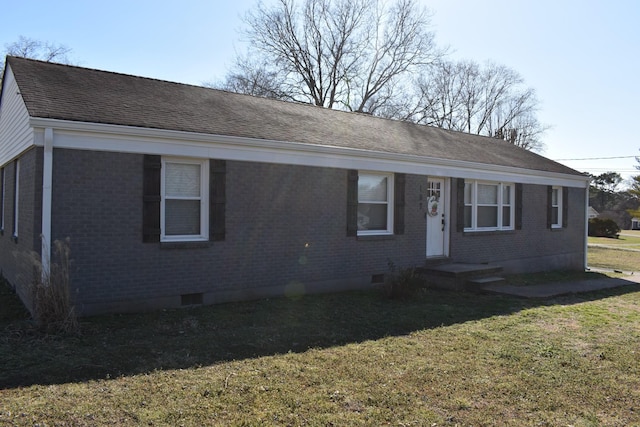 single story home featuring crawl space, brick siding, a front lawn, and roof with shingles