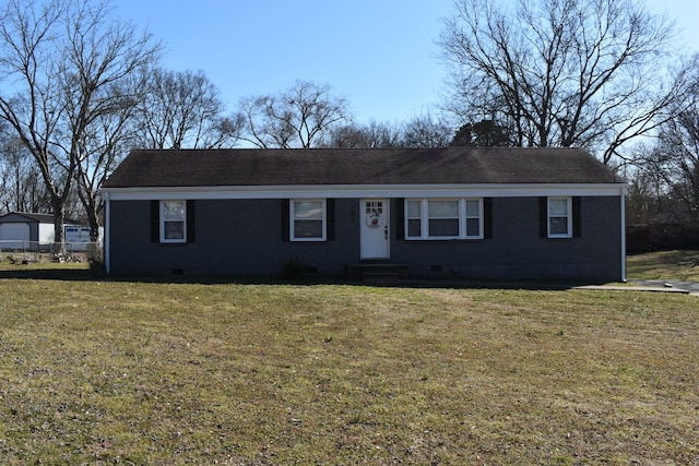 view of front facade with a front lawn, crawl space, a shingled roof, and brick siding