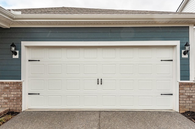 garage featuring driveway