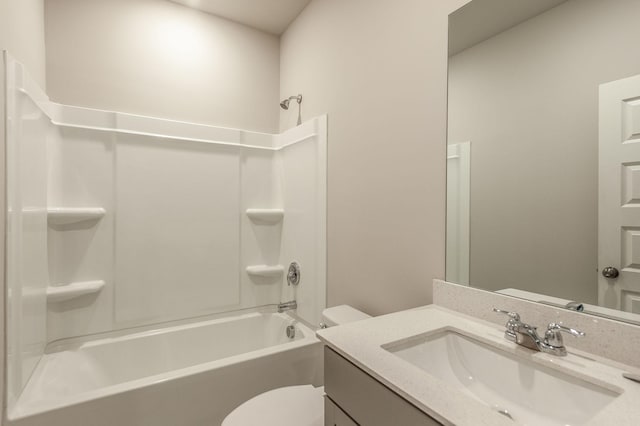 full bathroom featuring shower / bath combination, toilet, and vanity