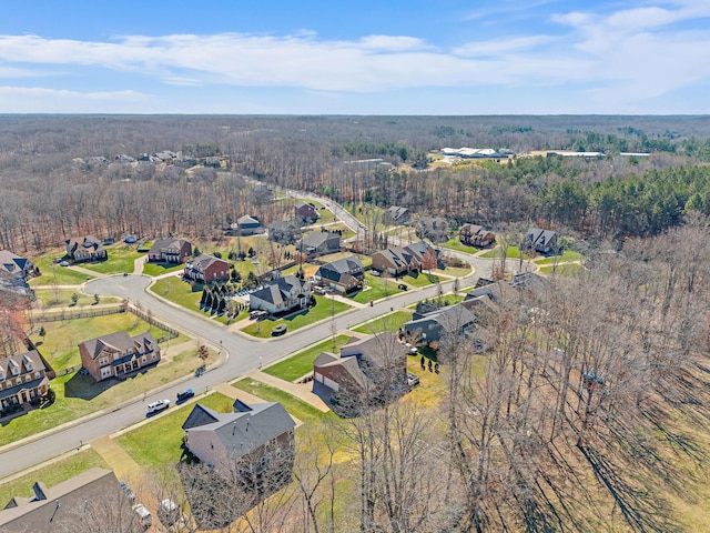 bird's eye view with a residential view and a view of trees