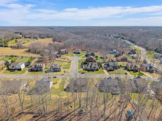 bird's eye view with a residential view and a view of trees