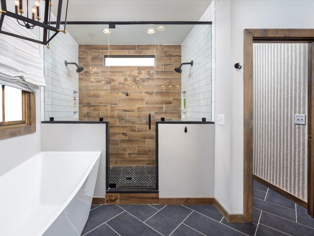 bathroom with a soaking tub, recessed lighting, a stall shower, and tile patterned floors