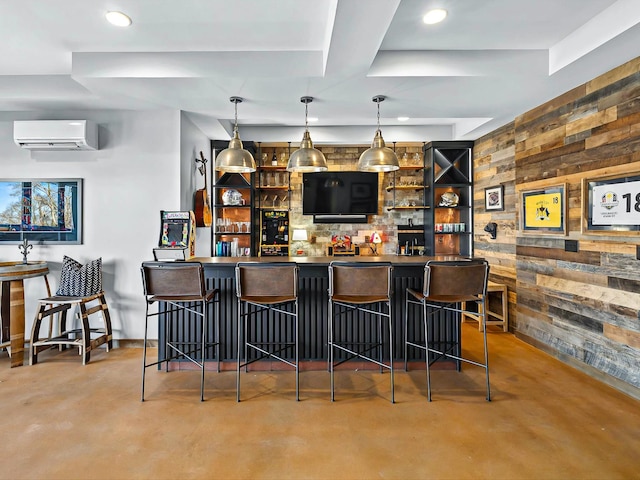 bar with recessed lighting, a wall mounted AC, finished concrete floors, wooden walls, and a bar