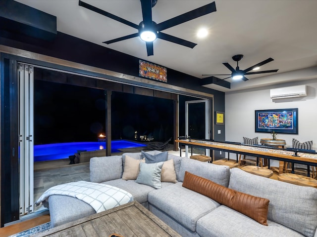 living room with ceiling fan, a wall unit AC, and recessed lighting