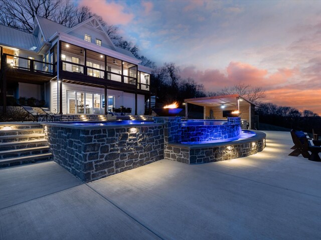 view of pool featuring a patio