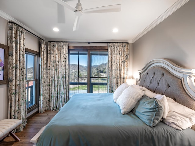 bedroom with a ceiling fan, wood finished floors, access to exterior, crown molding, and recessed lighting