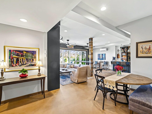 dining space featuring baseboards, a ceiling fan, an AC wall unit, concrete floors, and recessed lighting