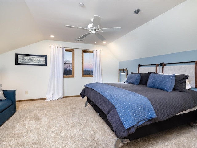 bedroom featuring lofted ceiling, baseboards, visible vents, and carpet