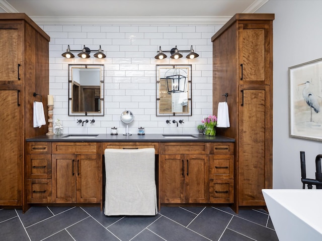 bathroom with ornamental molding, tile patterned flooring, and backsplash