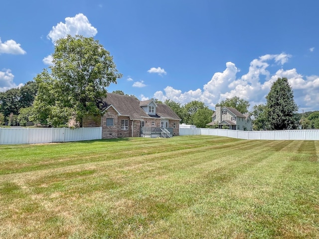 view of yard with fence