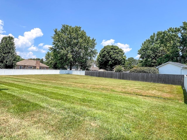 view of yard featuring fence