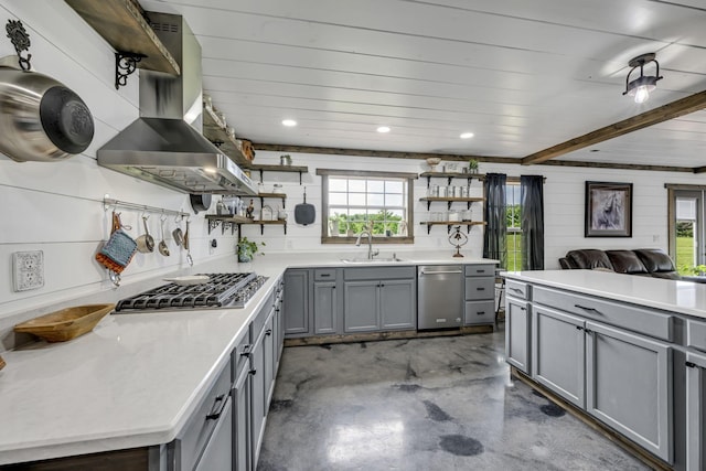 kitchen featuring open shelves, wall chimney exhaust hood, and gray cabinets