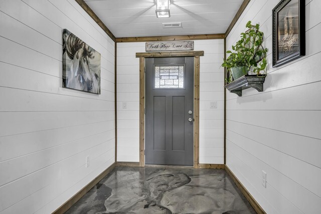 doorway to property featuring visible vents