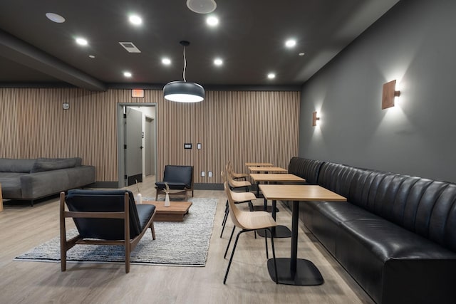 living room with visible vents, light wood-style flooring, and recessed lighting