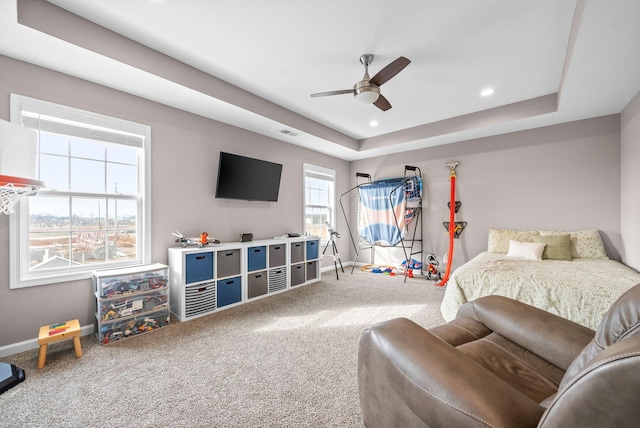 bedroom with recessed lighting, a raised ceiling, carpet flooring, ceiling fan, and baseboards