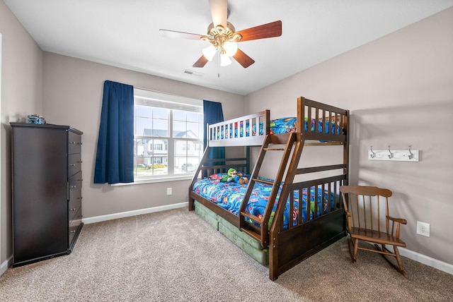 bedroom with baseboards, visible vents, ceiling fan, and carpet flooring